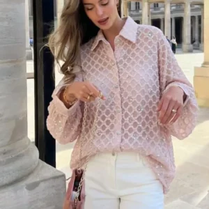 Camicia con rilievi e paillettes